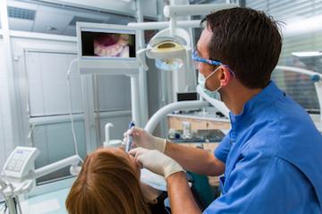 Dentist in Bellevue performing a dental exam