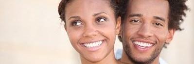Dental patients smiling at Bellevue dentist