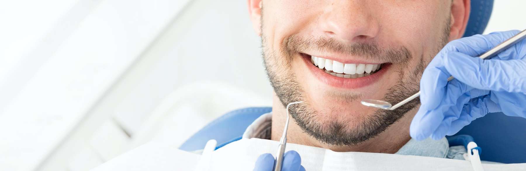 Close up of patient's smile at implant dentist in Bellevue, NE