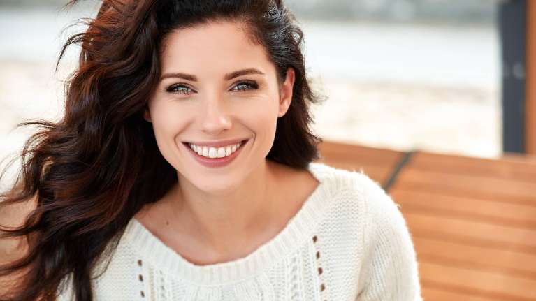 woman smiles