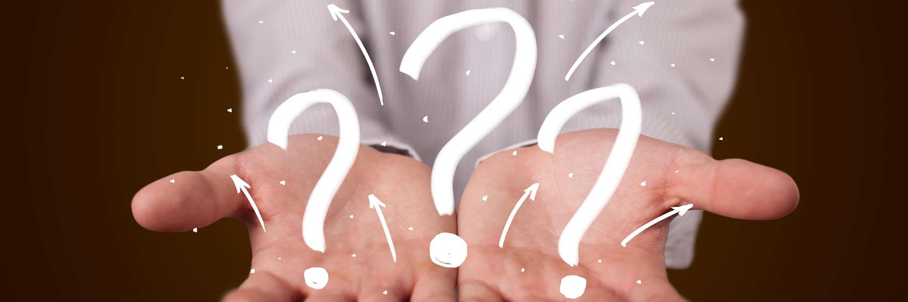 Hands extended with questions marks coming out