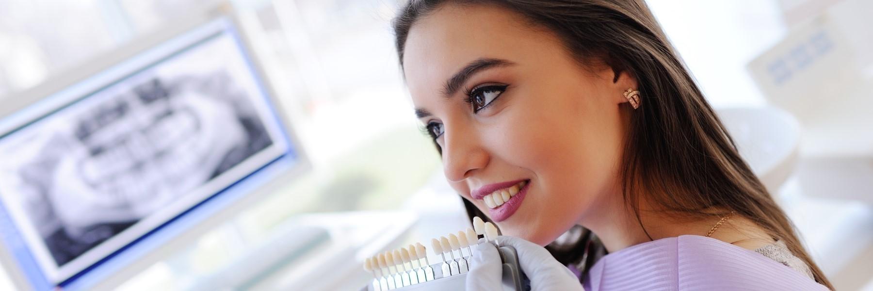 Patient at procedure for teeth whitening in Bellevue NE